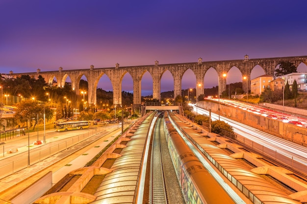 View of The Aguas Livres Aqueduct and Campolide train station, Lisbon, Portugal