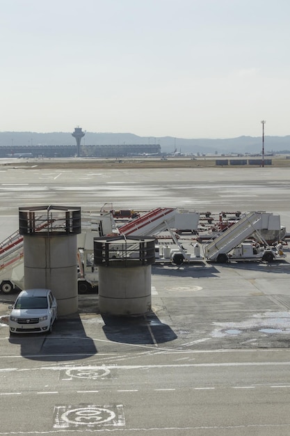 view of airport showing an airplane ready for takeoff airport building airport facilities