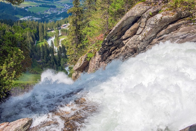 View Alpine inspiring Krimml waterfall in mountains in summer day. Trekking in National park Hohe Tauern, Austria