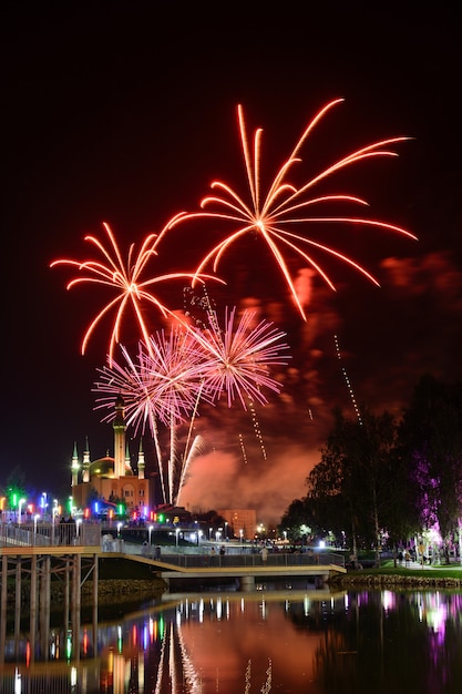 View to amazing fireworks glowing in the night sky