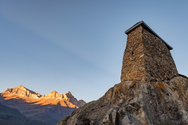 View of ancient stone Tower Fortress Amirkhan-Kala in Kabardino-Balkaria, Russia on autumn day