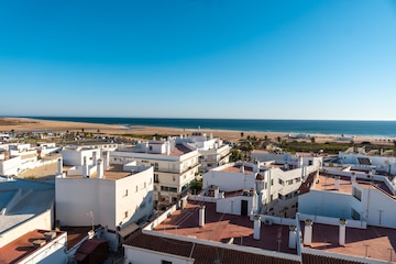 Premium Photo  Panoramic view of the town of conil de la frontera from the  torre de guzman cadiz andalusia