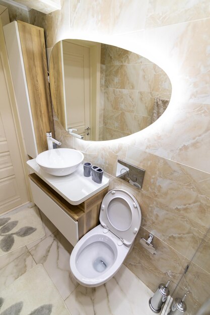 A view of bathroom with accessories and faucet