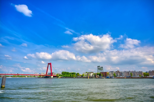 View of bay against cloudy sky