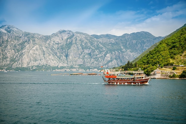 View of the Bay of Kotor and a sightseeing boat