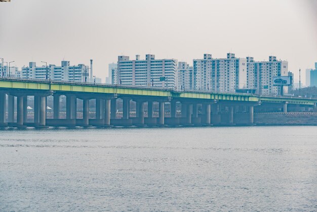 View of beach with city in background