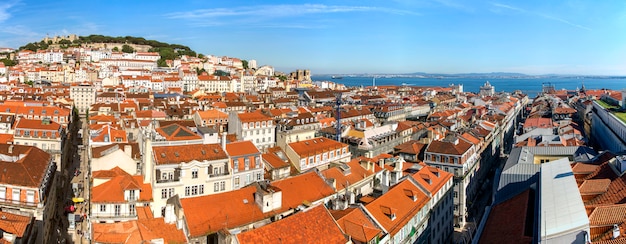 View of the beautiful Lisbon downtown area with landmark castle of Sao Jorge on top of the hill.