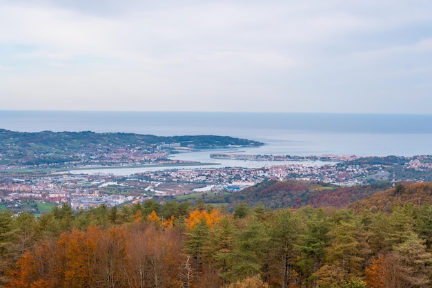 View of the Bidasoa river and the municipalities of Fuenterrabia and Hendaya from Mount Erlaitz in the town of Irun, Gipuzkoa. Basque Country