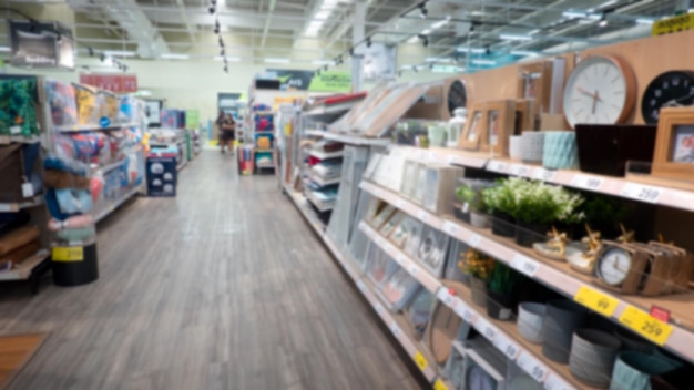 Photo view of blurred image of shopping shelf in the supermarket store