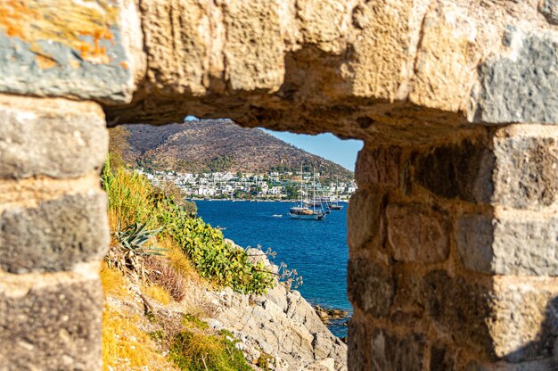 Photo view of the bodrum bay from the loophole of the castle of st peter