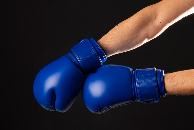 Photo view of boxing gloves on hands