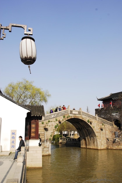 View of bridge over river against clear sky