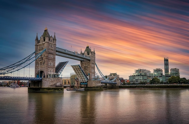 View of bridge over river against cloudy sky