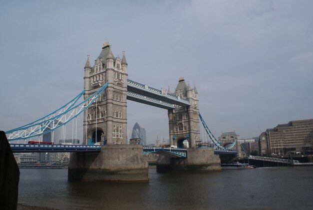 View of bridge over river in city