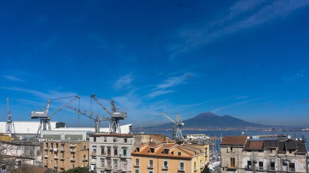 View of buildings against blue sky