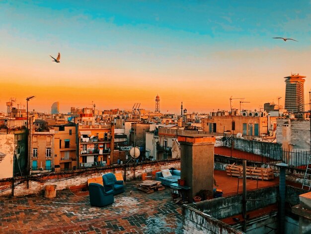 View of buildings against sky during sunset