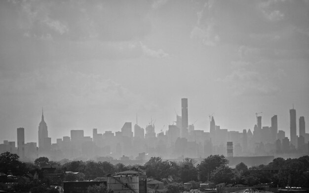 View of buildings in city against sky