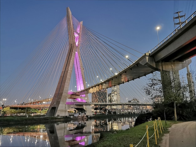 View of the cablestayed bridge of the marginal cycle lane at night.