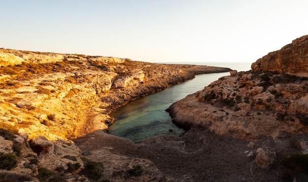 View of Cala Stretta at sunset in the summer season