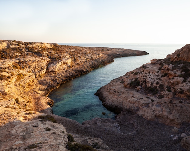  View of Cala Stretta at sunset in the summer season 