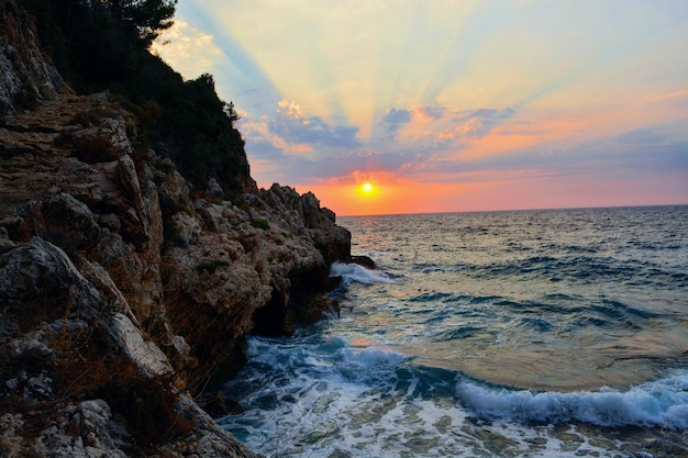 view of calm sea at sunset