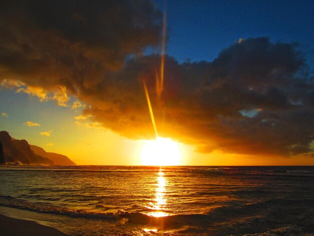 View of calm sea at sunset