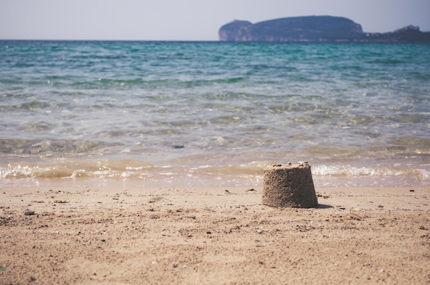 View of Capo Caccia from the beach of Mugoni