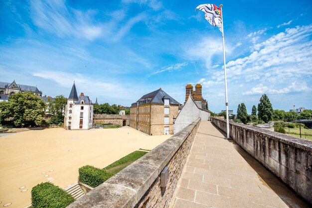 View on the castle of Dukes of Brittany during the sunny weather in Nantes city in France