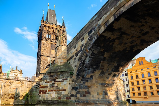 View on Charles bridge and Staromestska tower from below