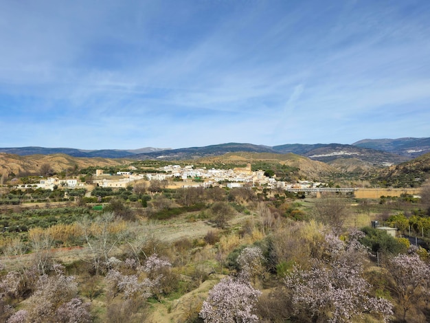 View of Cherin Ugijar with Sierra Nevada in the background in the Alpujarra of Granada