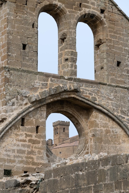 View of the church of Ujue Navarra from the ruins of a bell tower Spain