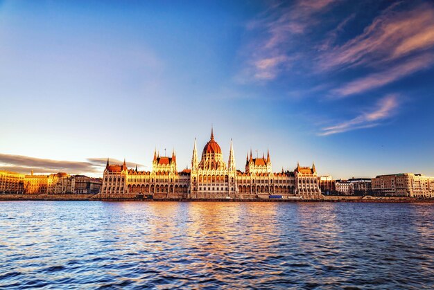 View of city against blue sky with waterfront