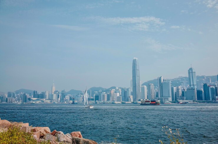 Photo view of city buildings against sky