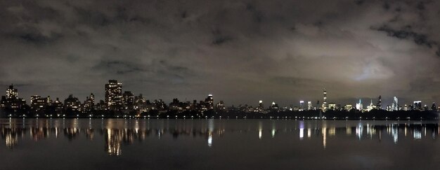 Photo view of city lit up at night