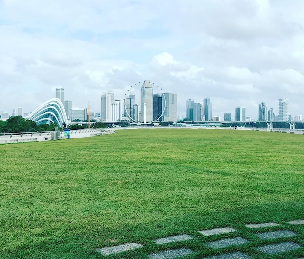 View of city skyline against cloudy sky