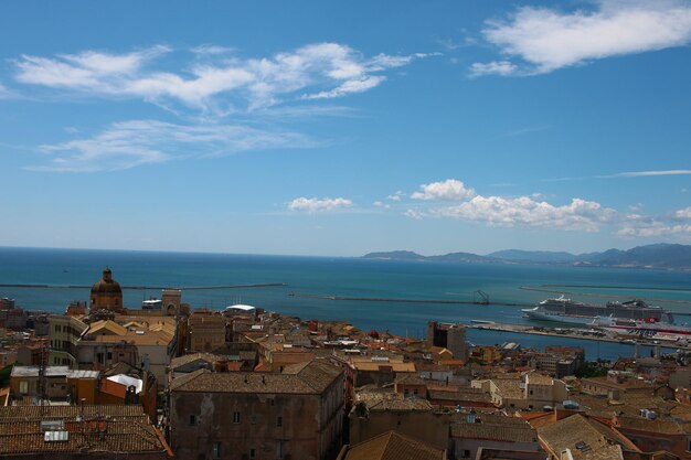 View of cityscape against blue sky