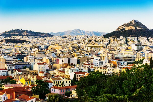 View of cityscape against clear blue sky