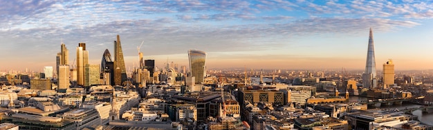 Photo view of cityscape against sky during sunset