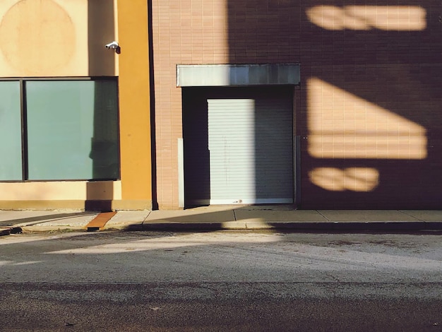 Photo view of closed shutter of building