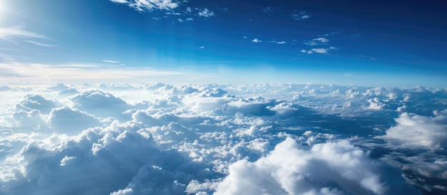 Photo view of clouds and sky from an airplanes window