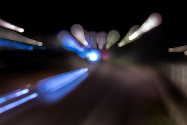 View of colorful defused bokeh city lights in motion.