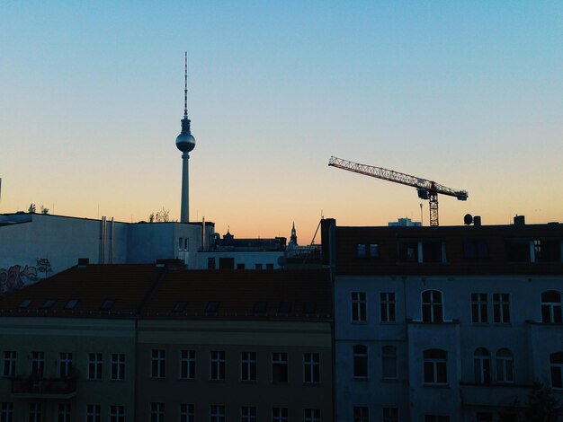 View of communications tower in city