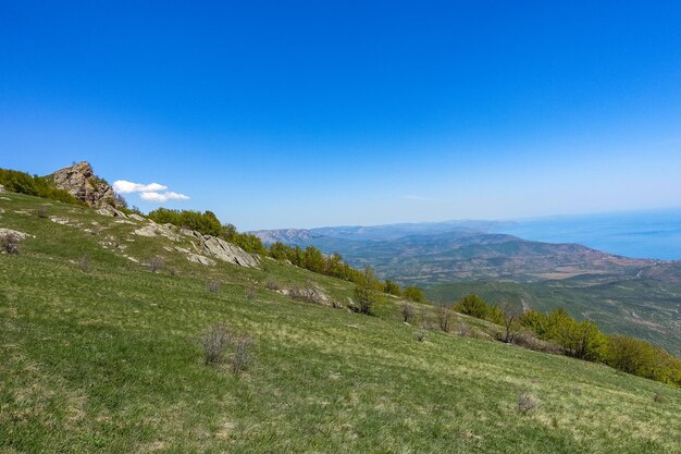 View of the Crimean Mountains plateau and the Black Sea from the top of the Demerdzhi Russia