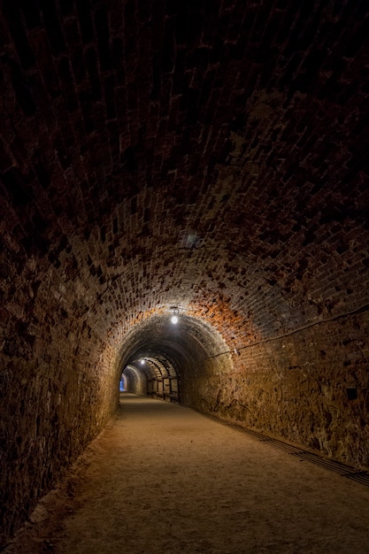 View of a dark eerie mining tunnel.