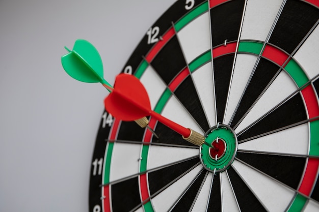 Photo view of dartboard with bullseye arrow points