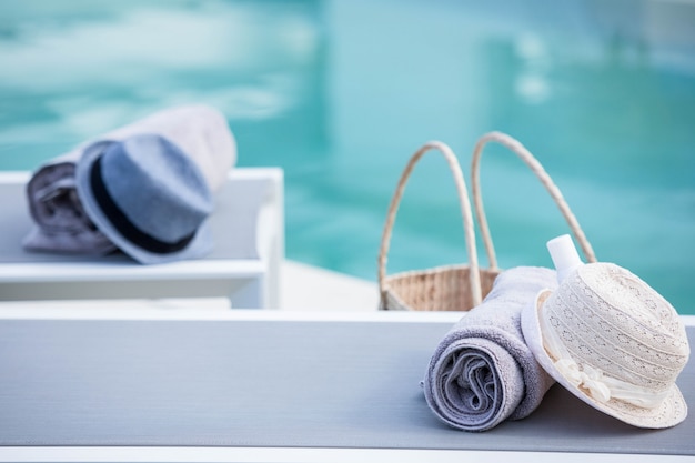 View of deck chairs by the pool