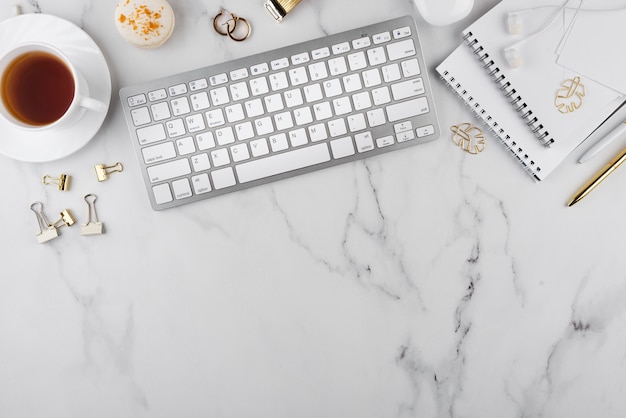 Above view desk elements on marble table