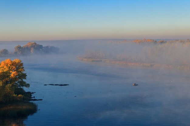 View on the Dnieper river in fog in the morning at autumn