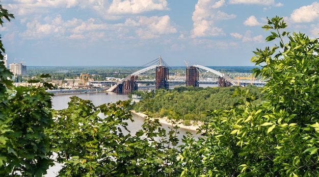 View of the Dnieper river with a bridge under construction in Kiev