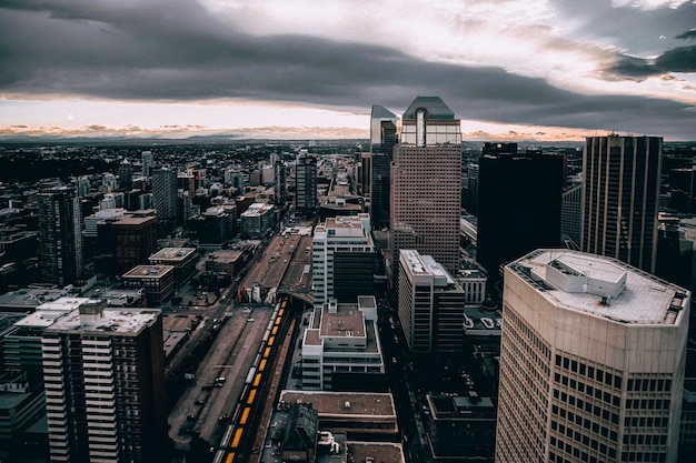 View of downtown Calgary with cloudy sky Alberta Canada Dark urban background